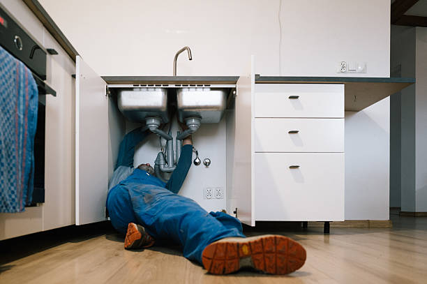 Professional Emergency Plumber technician working in Marshfield, MO